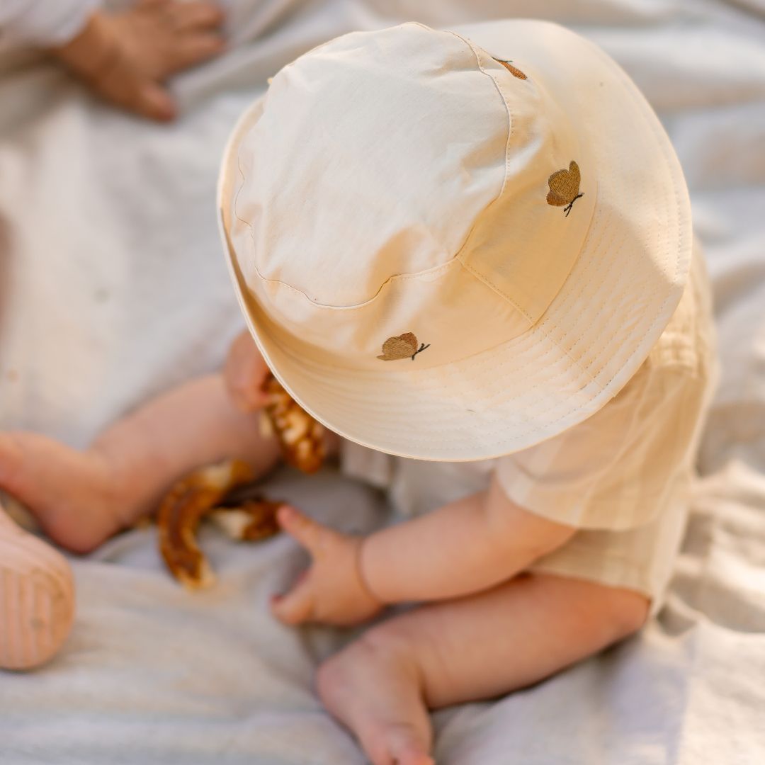 nuuroo Alpha bucket hat Bøllehat Cream butterfly