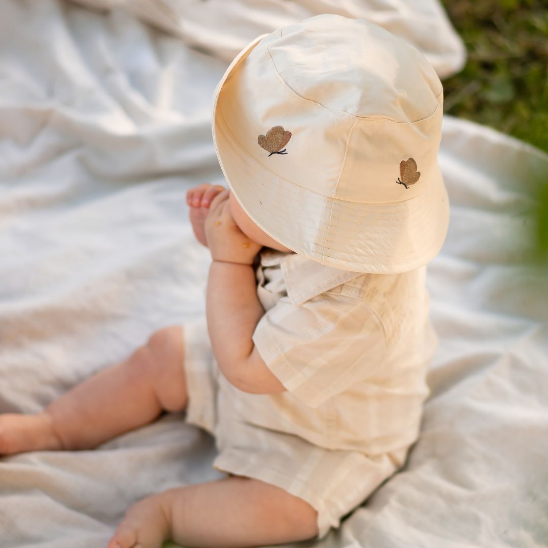 nuuroo Alpha bucket hat Bøllehat Cream butterfly
